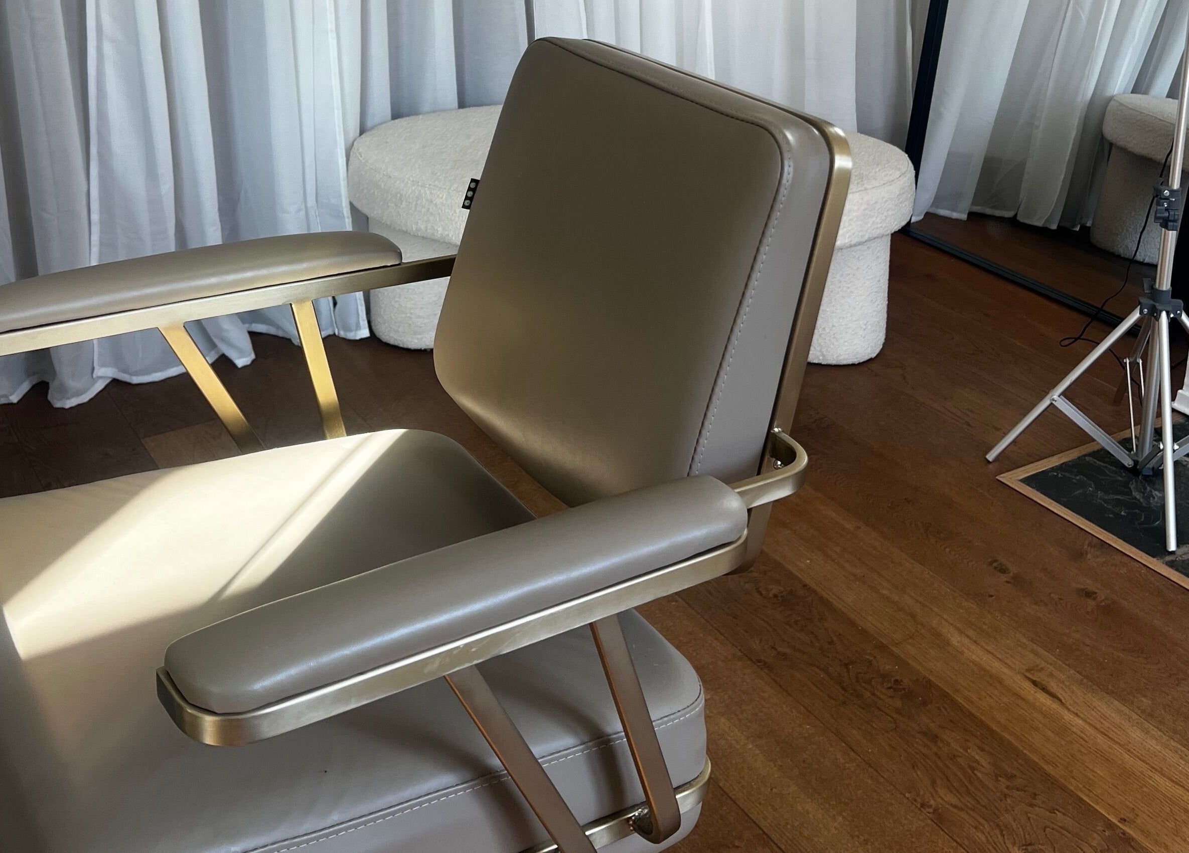 Luxurious salon chair at Lengths | By CJP, Writtle, England, GB. Sleek design in a serene setting.