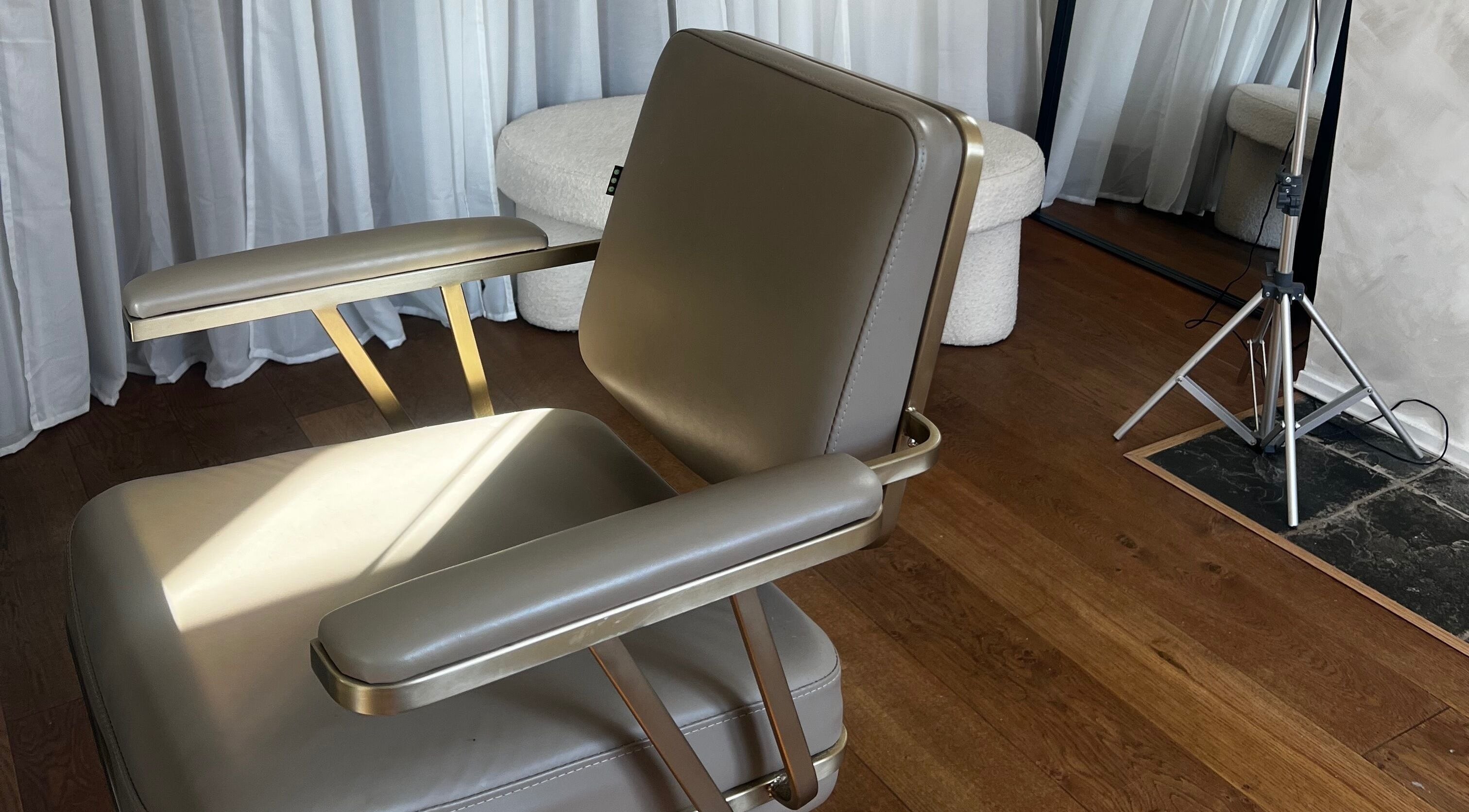 Luxurious salon chair at Lengths | By CJP, Writtle, England, GB. Sleek design in a serene setting.