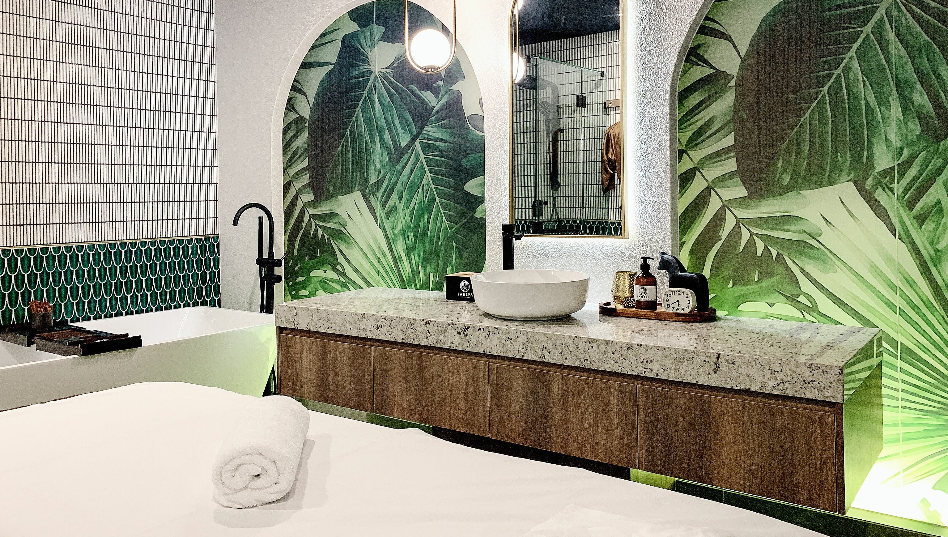 Luxurious spa room at Lan Spa, Surfers Paradise, Queensland, AU, featuring tropical decor and plush amenities.
