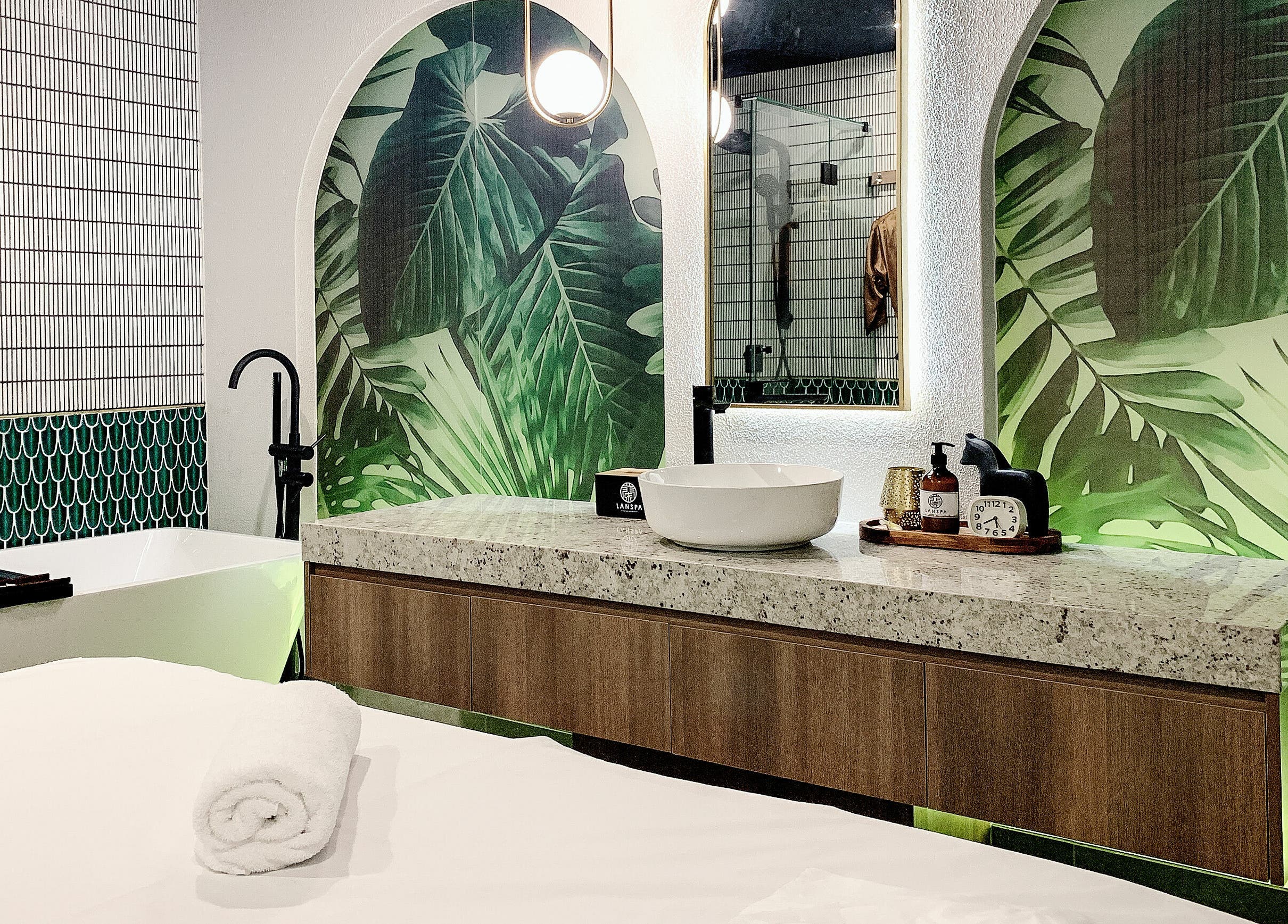 Luxurious spa room at Lan Spa, Surfers Paradise, Queensland, AU, featuring tropical decor and plush amenities.