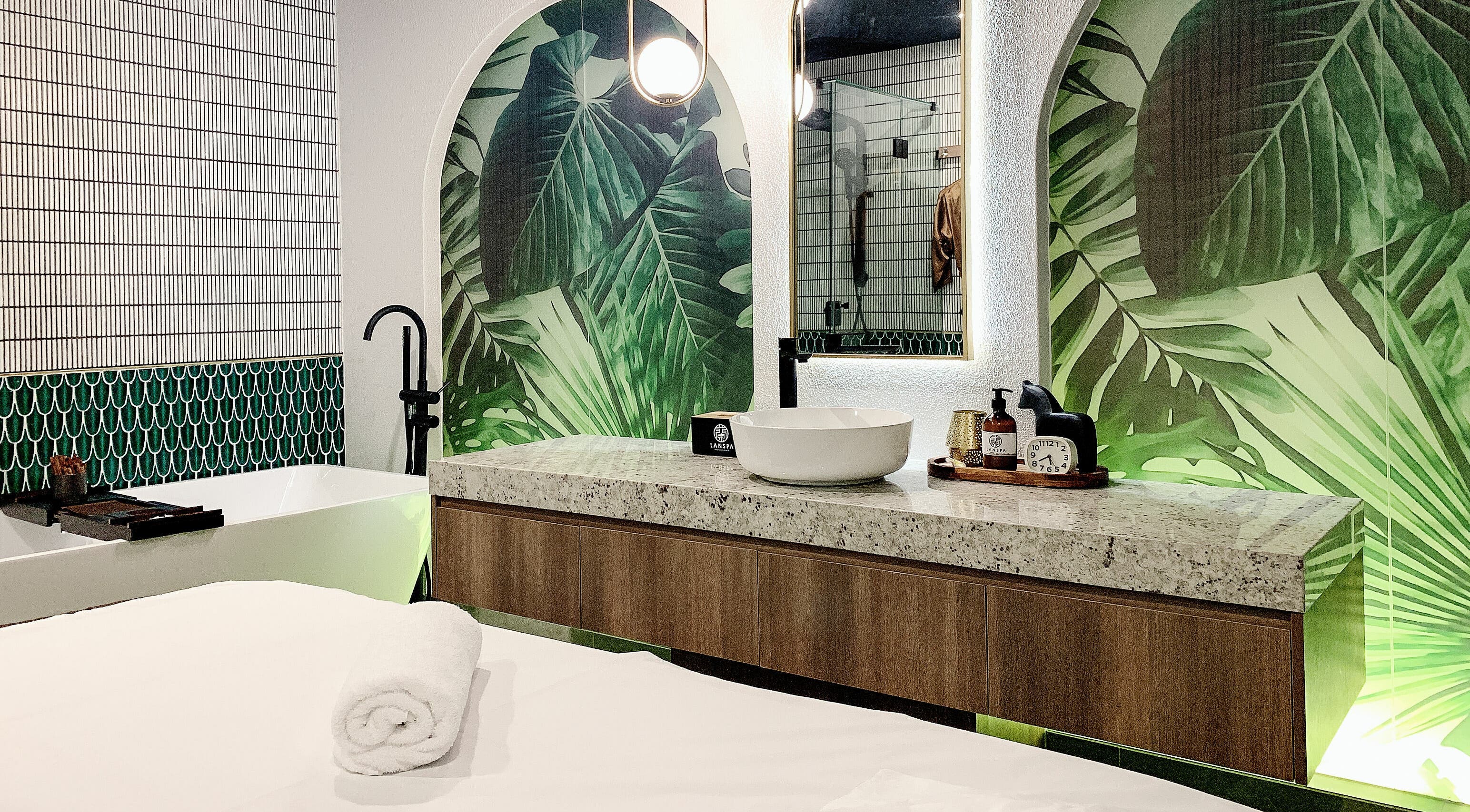 Luxurious spa room at Lan Spa, Surfers Paradise, Queensland, AU, featuring tropical decor and plush amenities.