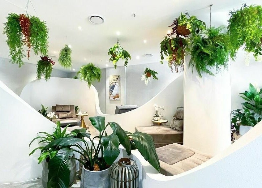 Relaxing lounge with lush greenery at Lan Spa in Surfers Paradise, Queensland, AU.