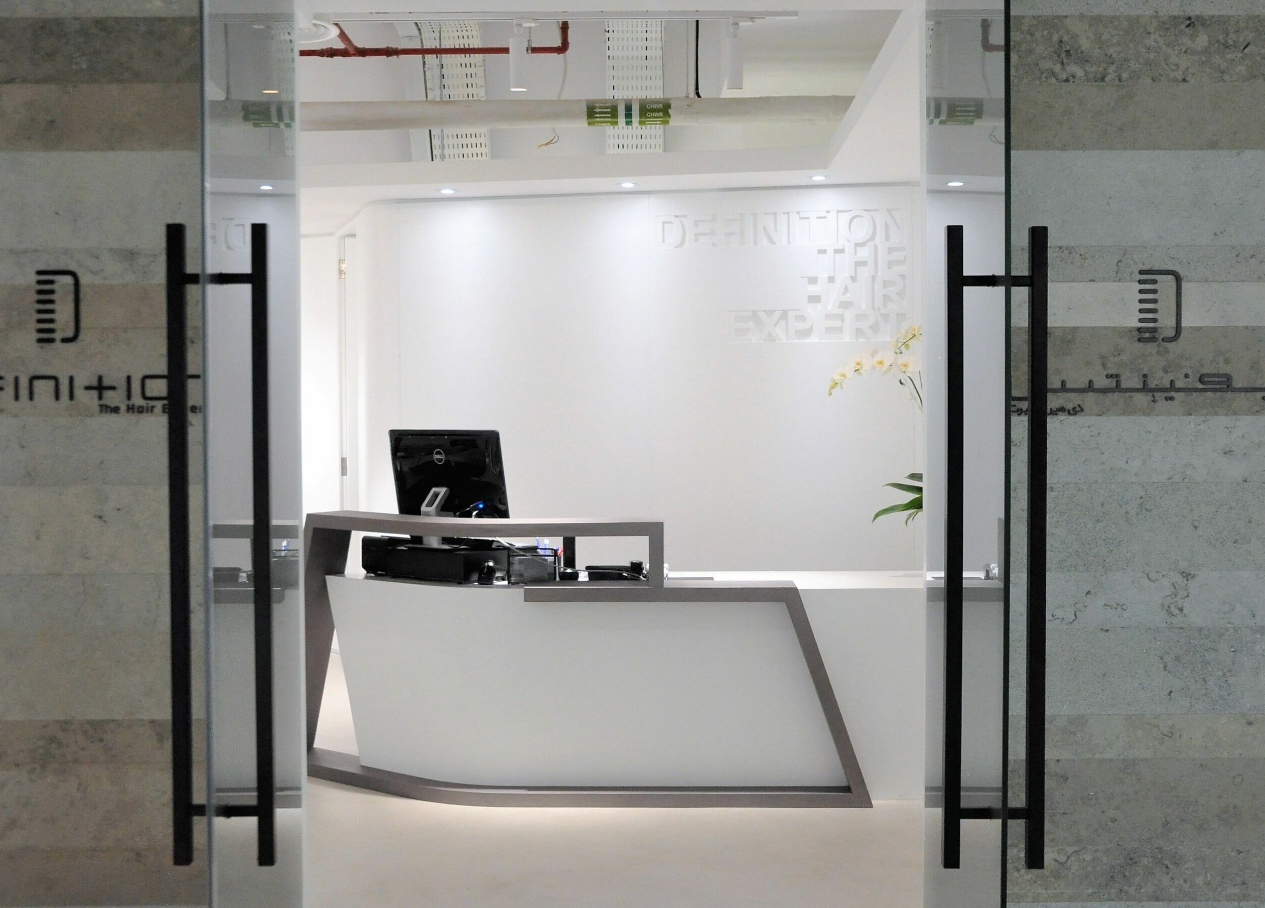 Sleek reception at Definition - The Hair Expert, Abu Dhabi, Abu Dhabi, AE, showcases modern design.