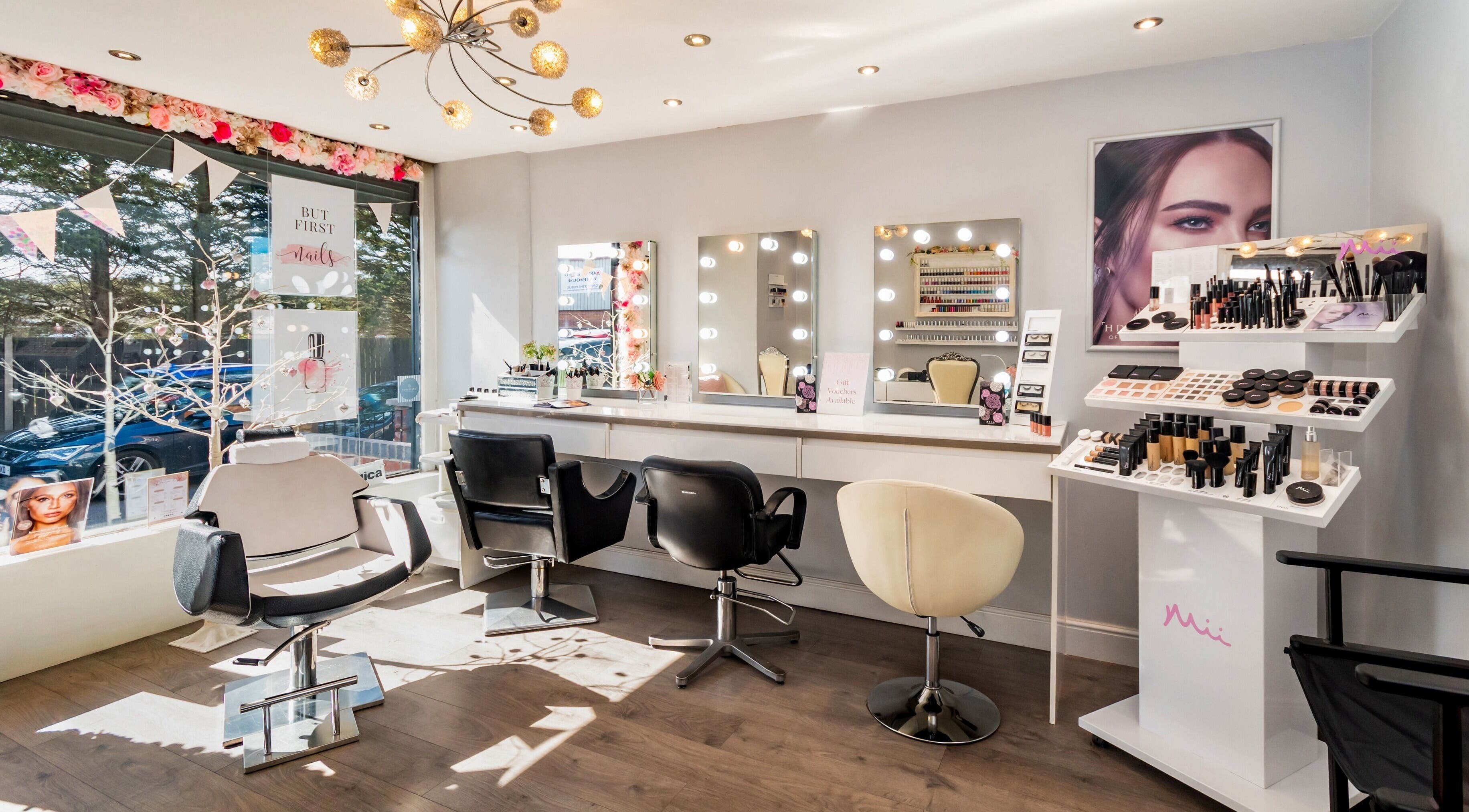 Effleurage Hair and Beauty Limited in Langley Mill, England offers a chic salon interior with stylish seating and makeup display.