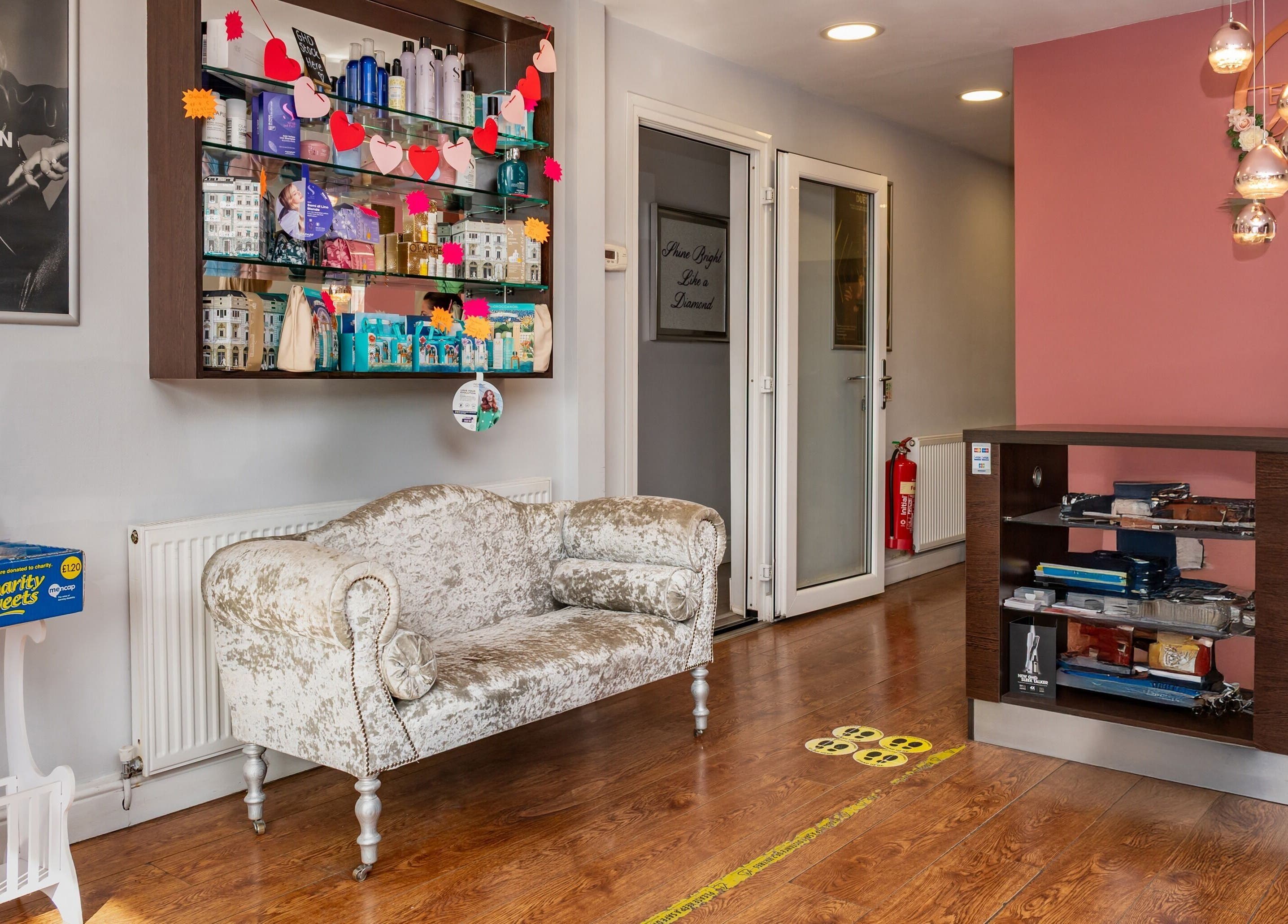 Effleurage Hair and Beauty Limited entryway with plush seating in Langley Mill, England, GB.