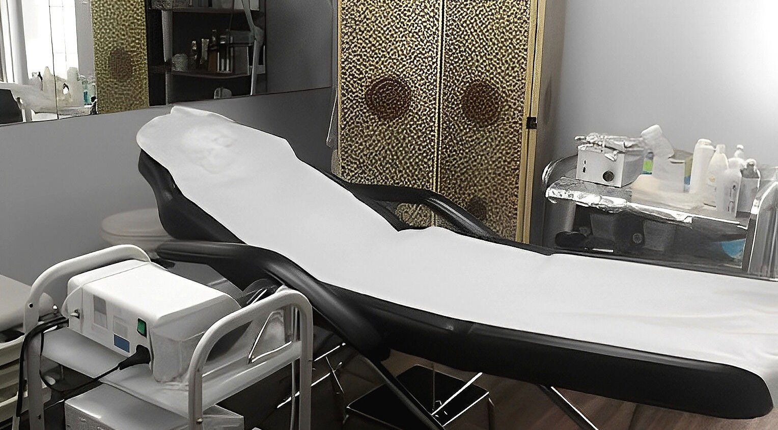 Massage bed and equipment at Lady Ming Esthetique, Edmonton, Alberta, CA. Perfect for relaxation and beauty treatments.