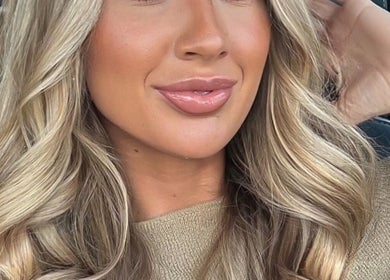 Woman with styled blonde hair at Her Wellness Space, Biggera Waters, Queensland, AU.