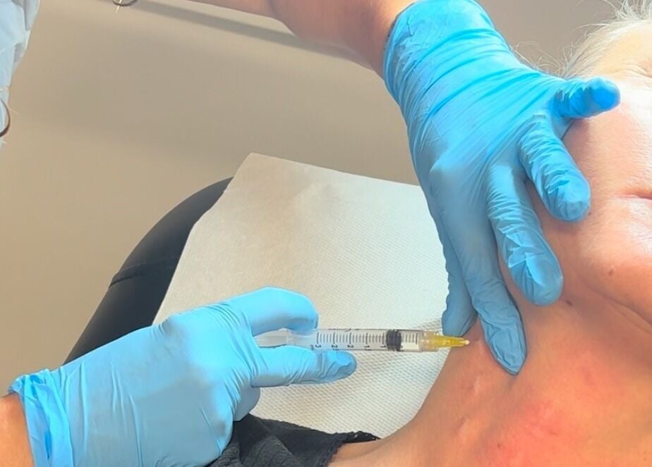 Facial injection treatment at Nu-Yu Advanced Skin Solutions in Sidcup, England, GB enhancing youthful glow.