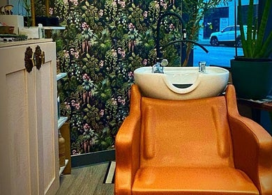 Luxurious salon chair and sink at Glendale Arts+Salon, Chicago, Illinois, US, offering a tranquil experience.