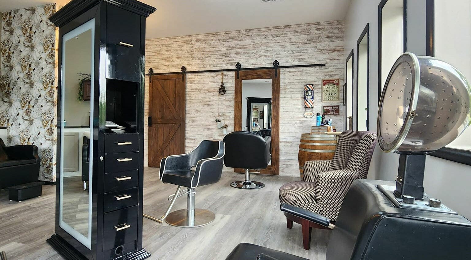 Elegant interior of Revival Hair Studio in Onsted, Michigan, US, featuring stylish chairs and modern decor.
