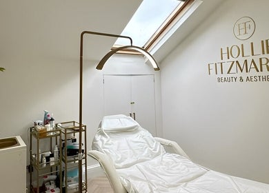 Elegant treatment room at Hollie Fitzmartin Studio and Academy, Atherton, England, GB, featuring modern aesthetics.