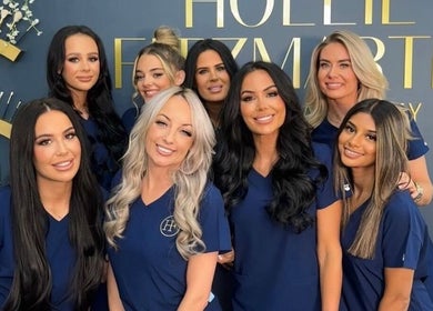 Team of stylists smiling at Hollie Fitzmartin Studio and Academy, Atherton, England, GB.