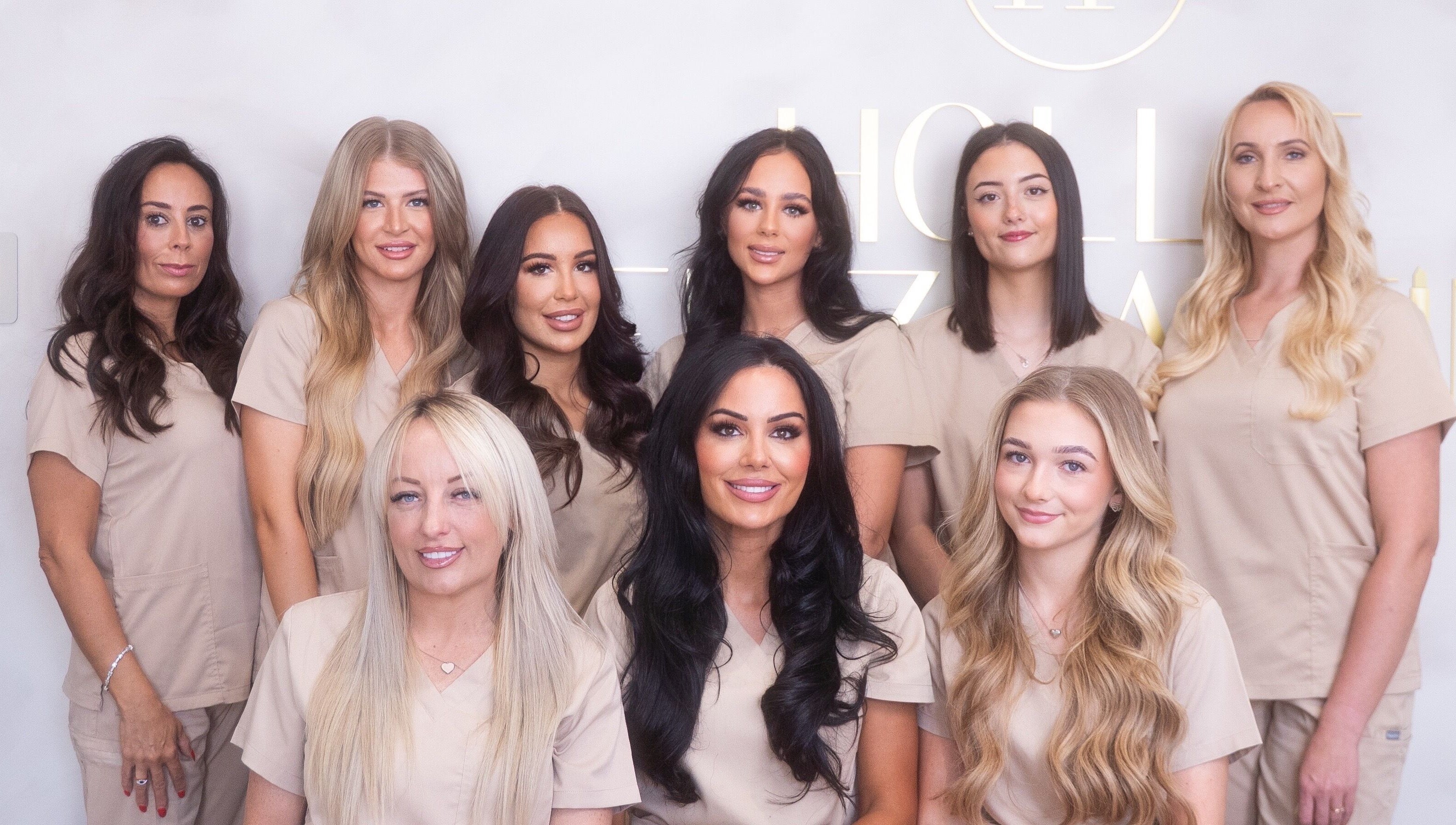 Hollie Fitzmartin Studio and Academy team smiling at Atherton, England, GB.