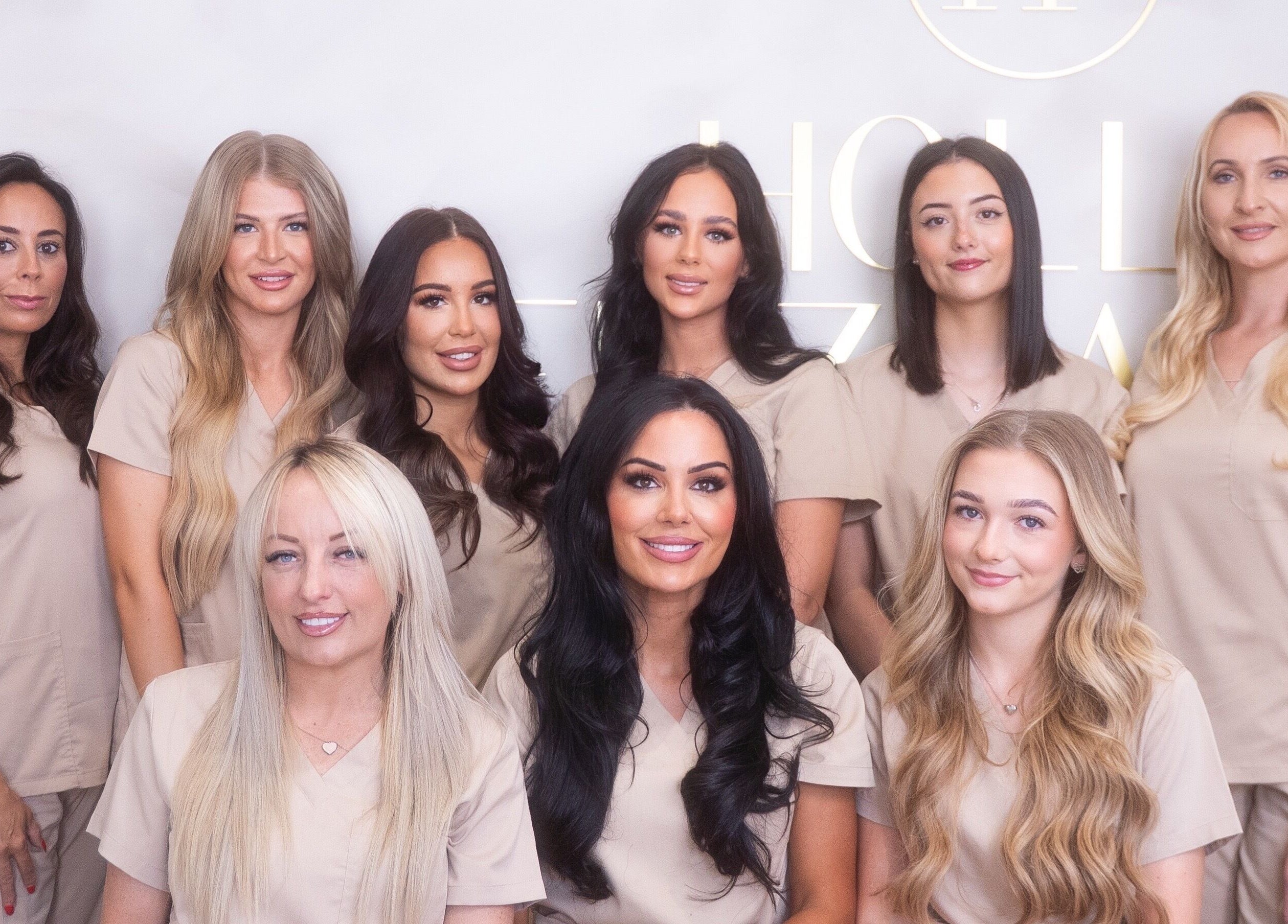 Hollie Fitzmartin Studio and Academy team smiling at Atherton, England, GB.