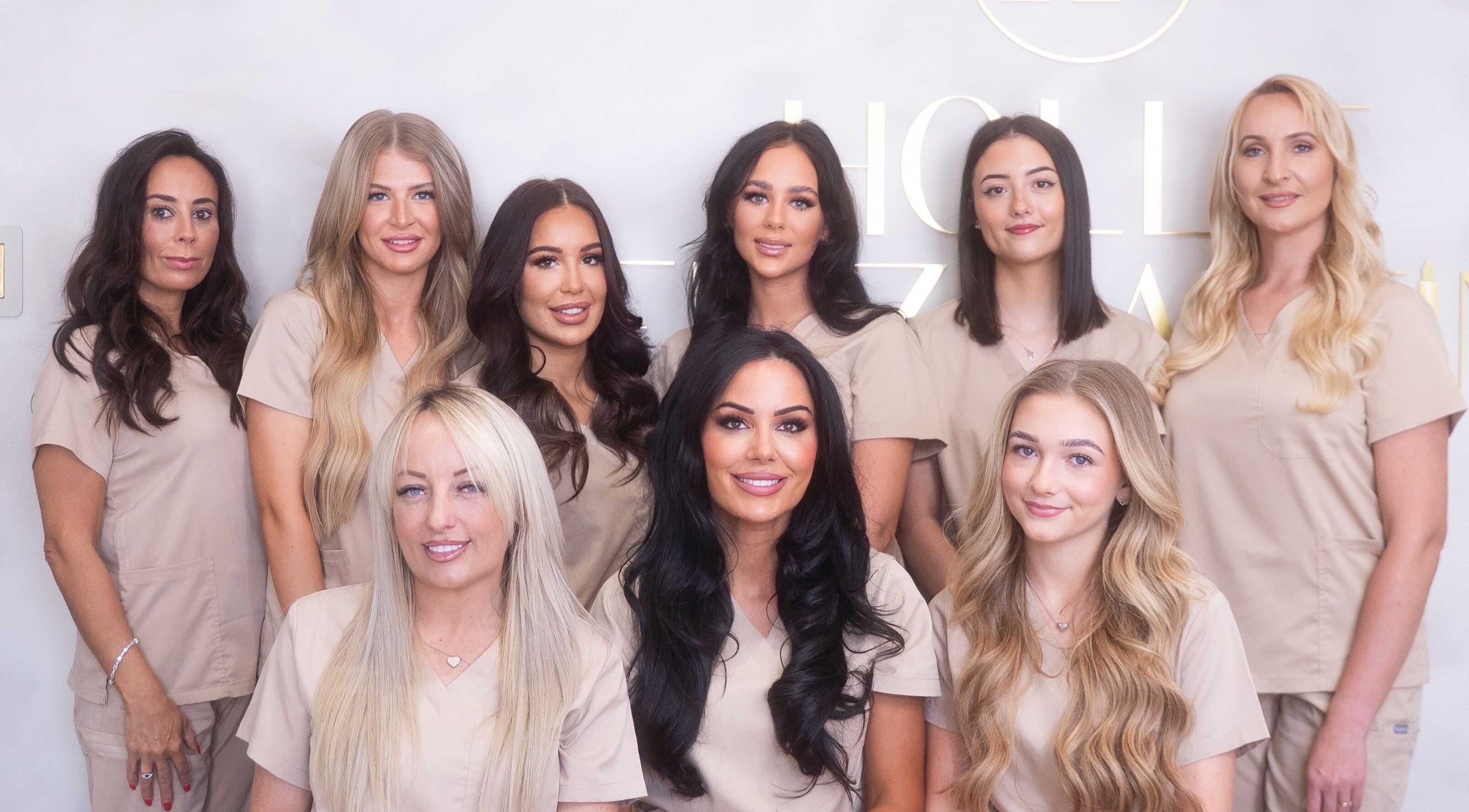 Hollie Fitzmartin Studio and Academy team smiling at Atherton, England, GB.