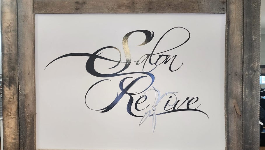 Elegant calligraphy sign at Starrlight Beauty in Minerva, Ohio, US, showcasing a chic salon atmosphere.