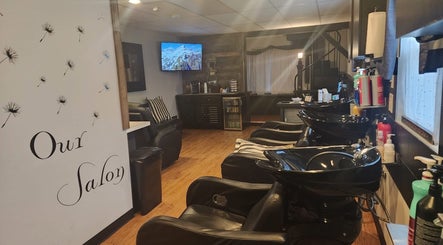 Cozy interior of Starrlight Beauty in Minerva, Ohio with modern salon chairs and tranquil decor.