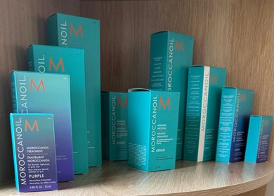 Moroccanoil products on display shelf at Seats Hair Studio, Leicester, England, GB.