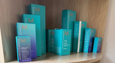 Moroccanoil products on display shelf at Seats Hair Studio, Leicester, England, GB.