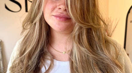 Beautiful blonde hairstyle at TIEGAN SEATON (Seats Hair Studio) in Anstey, England, GB.