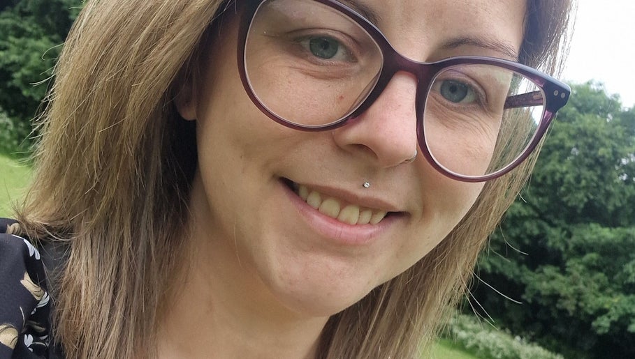 Smiling person outdoors near Beauty and Hair So Lovely, Braunstone Town, England, GB.