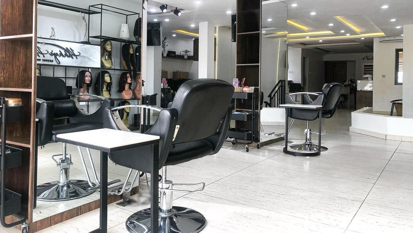 Interior of The Hikky's Hair Studio in Lagos, Lagos, NG showcasing modern salon chairs and decor.