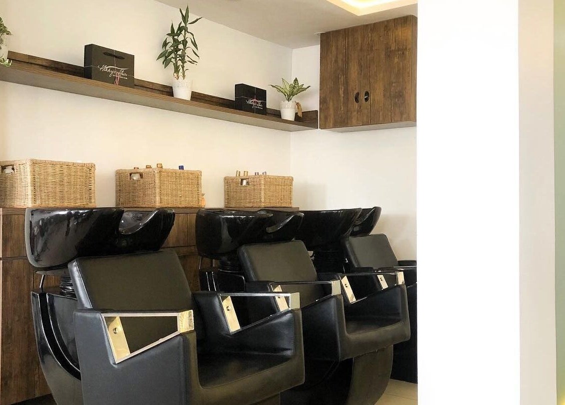Sleek shampoo stations at The Hikky's Hair Studio in Lagos, Lagos, NG offer a modern and inviting vibe.