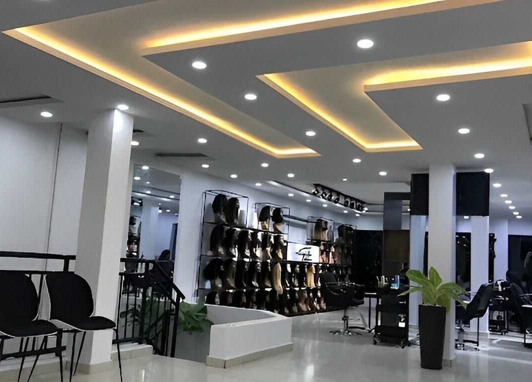 Modern interior of The Hikky's Hair Studio, Lagos, Lagos, NG, featuring sleek design and elegant lighting.