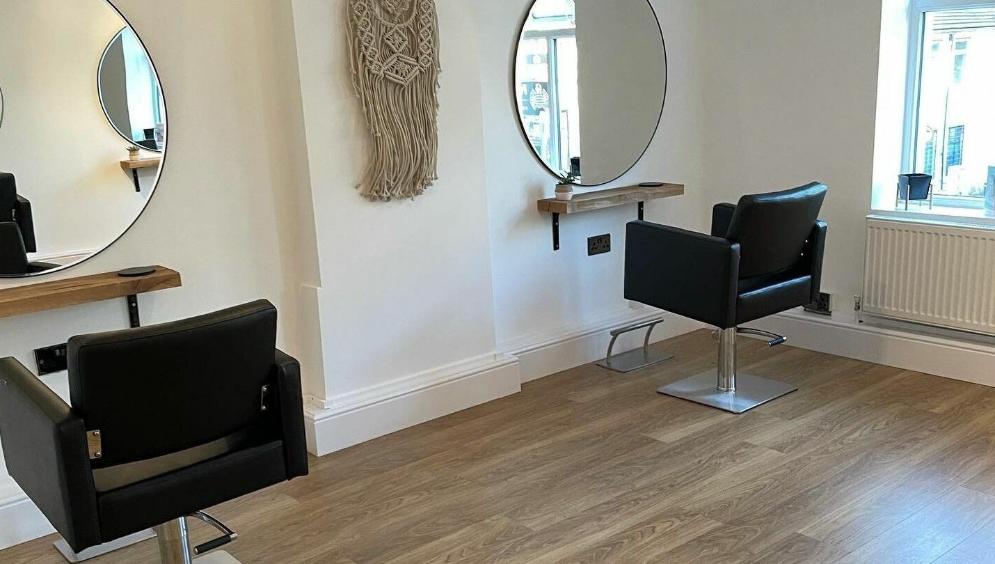 Modern salon chairs and mirrors at Styled By Emily LTD in Darwen, England, GB, offering a stylish ambiance.