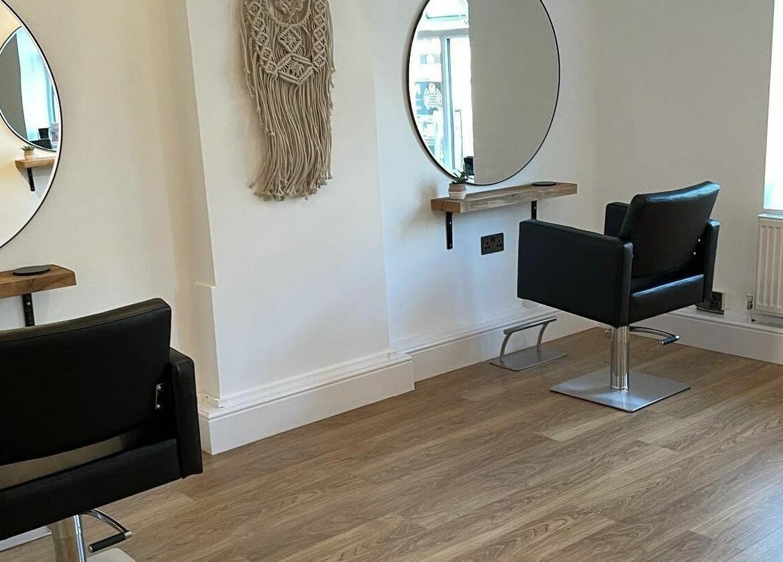 Modern salon chairs and mirrors at Styled By Emily LTD in Darwen, England, GB, offering a stylish ambiance.