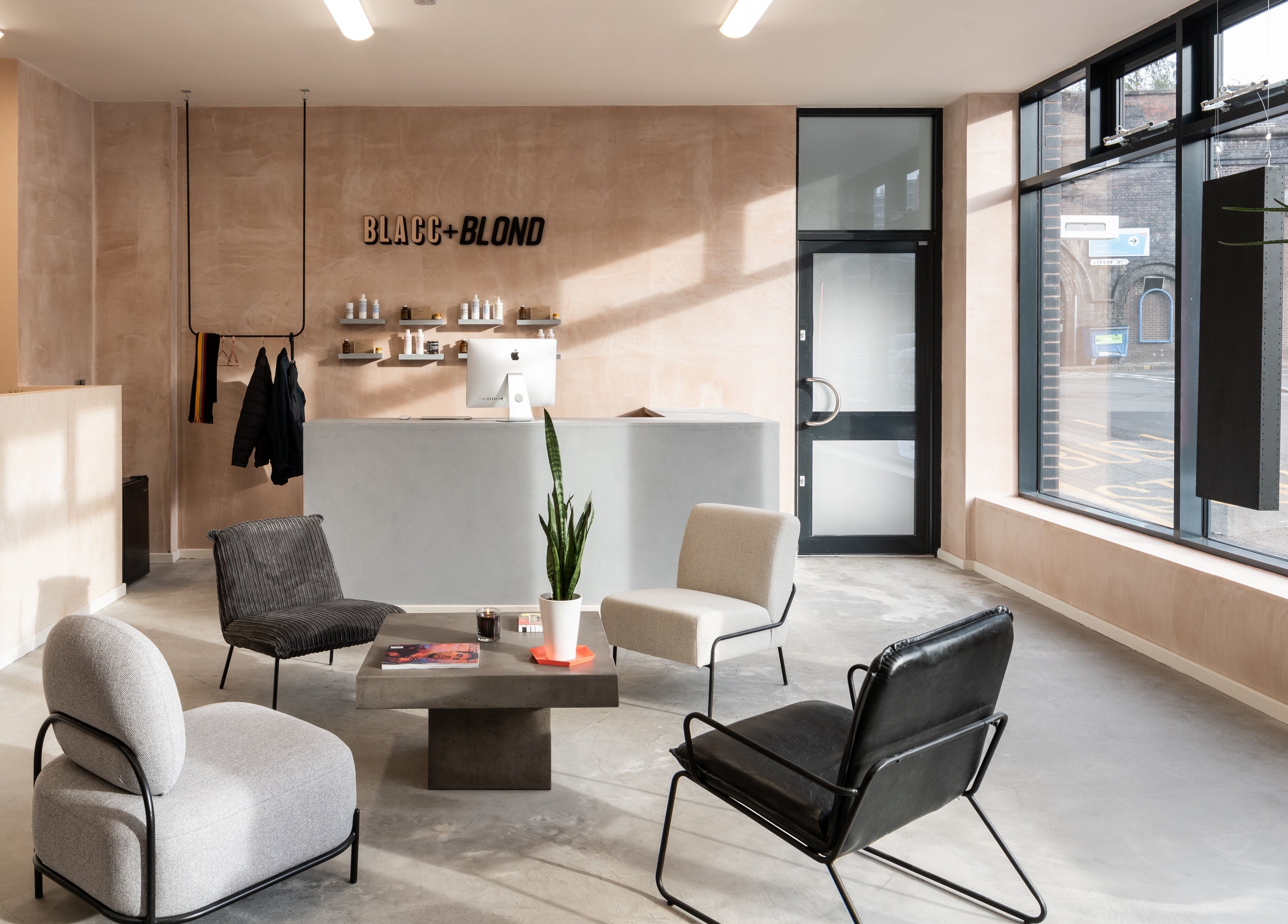 Modern lounge area at BLACC + BLOND, Birmingham, England, GB with stylish seating and decor.