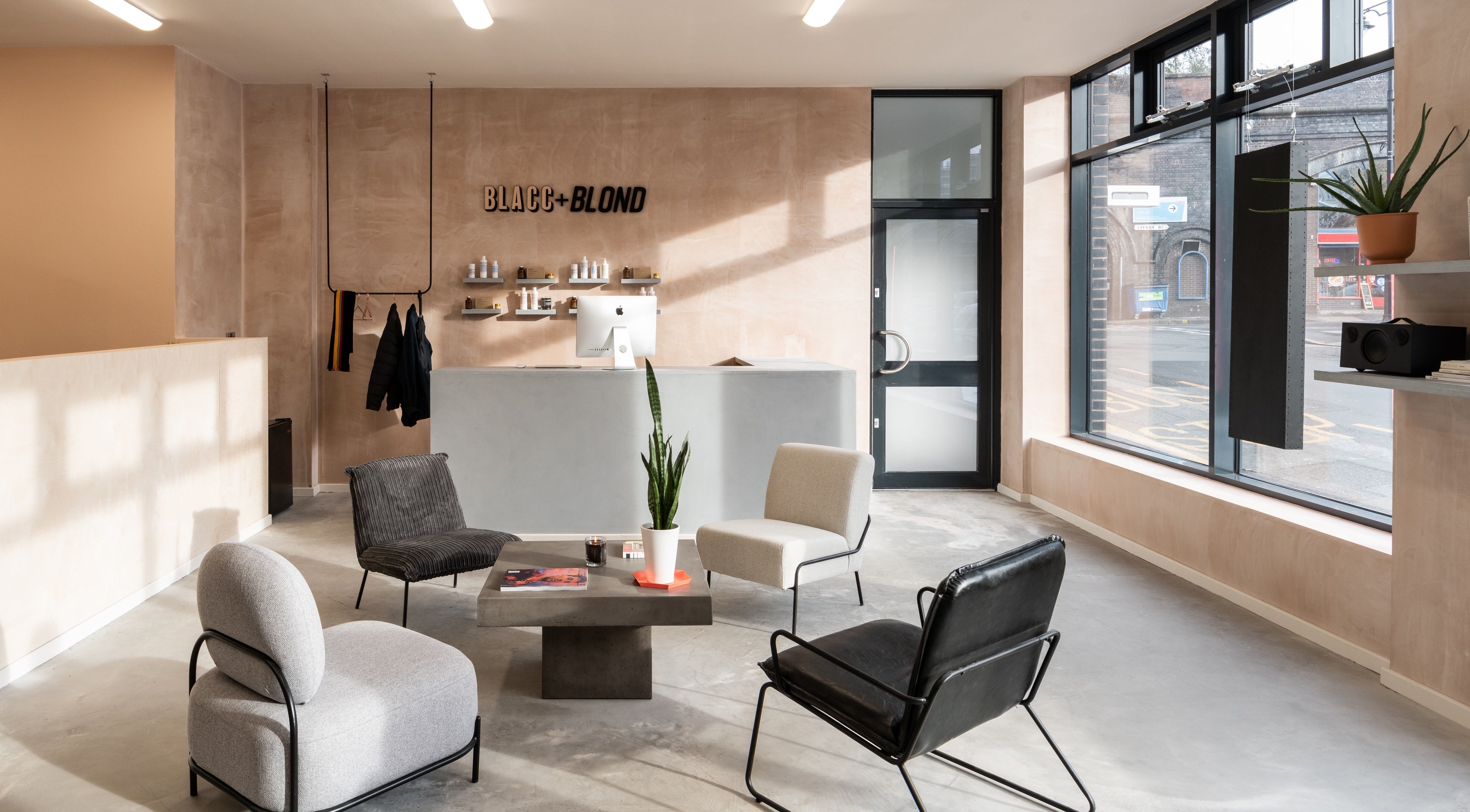 Modern lounge area at BLACC + BLOND, Birmingham, England, GB with stylish seating and decor.