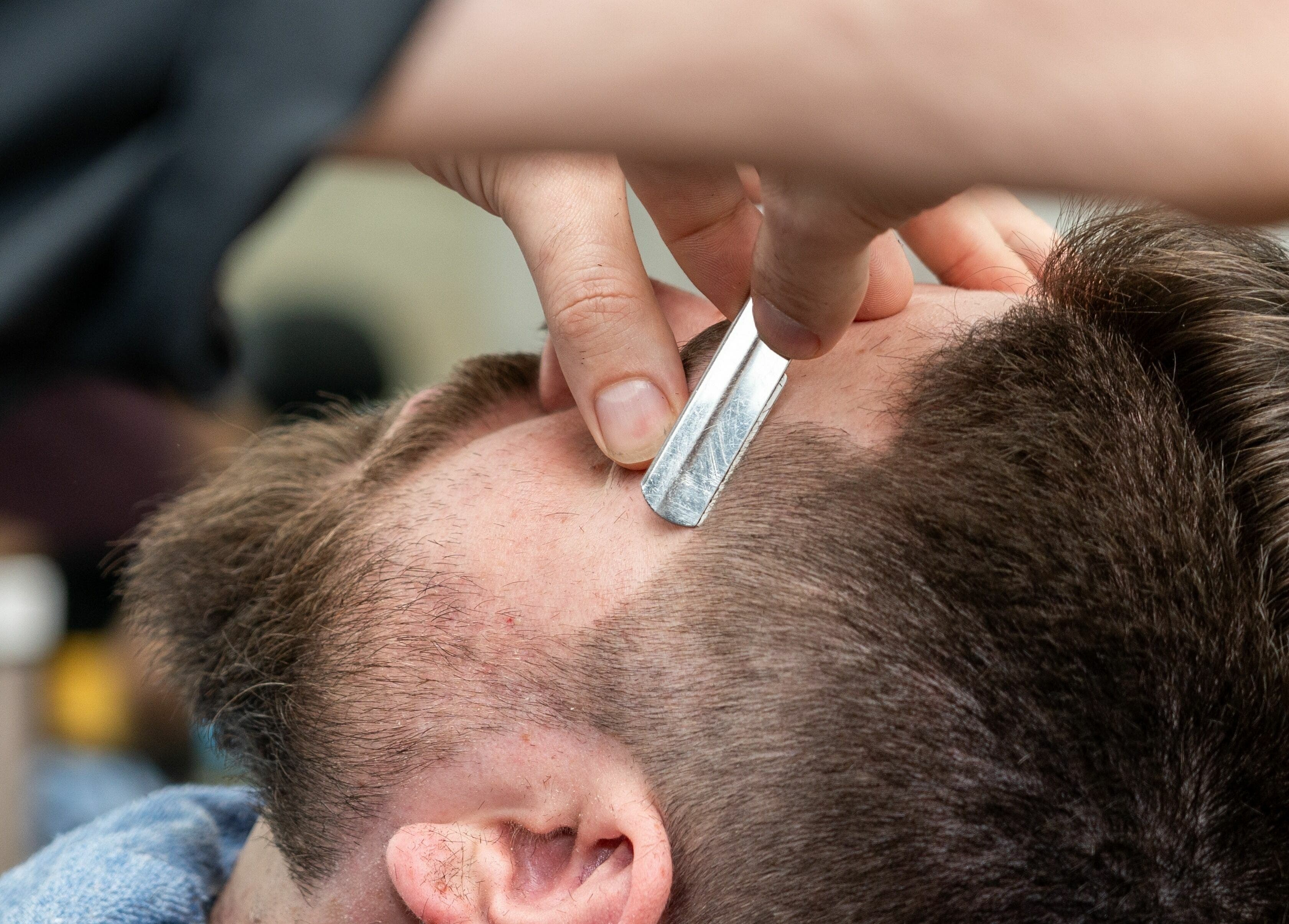 Precision shave at Scissor's Palace in Evanston, Illinois, US showcasing expert grooming services.