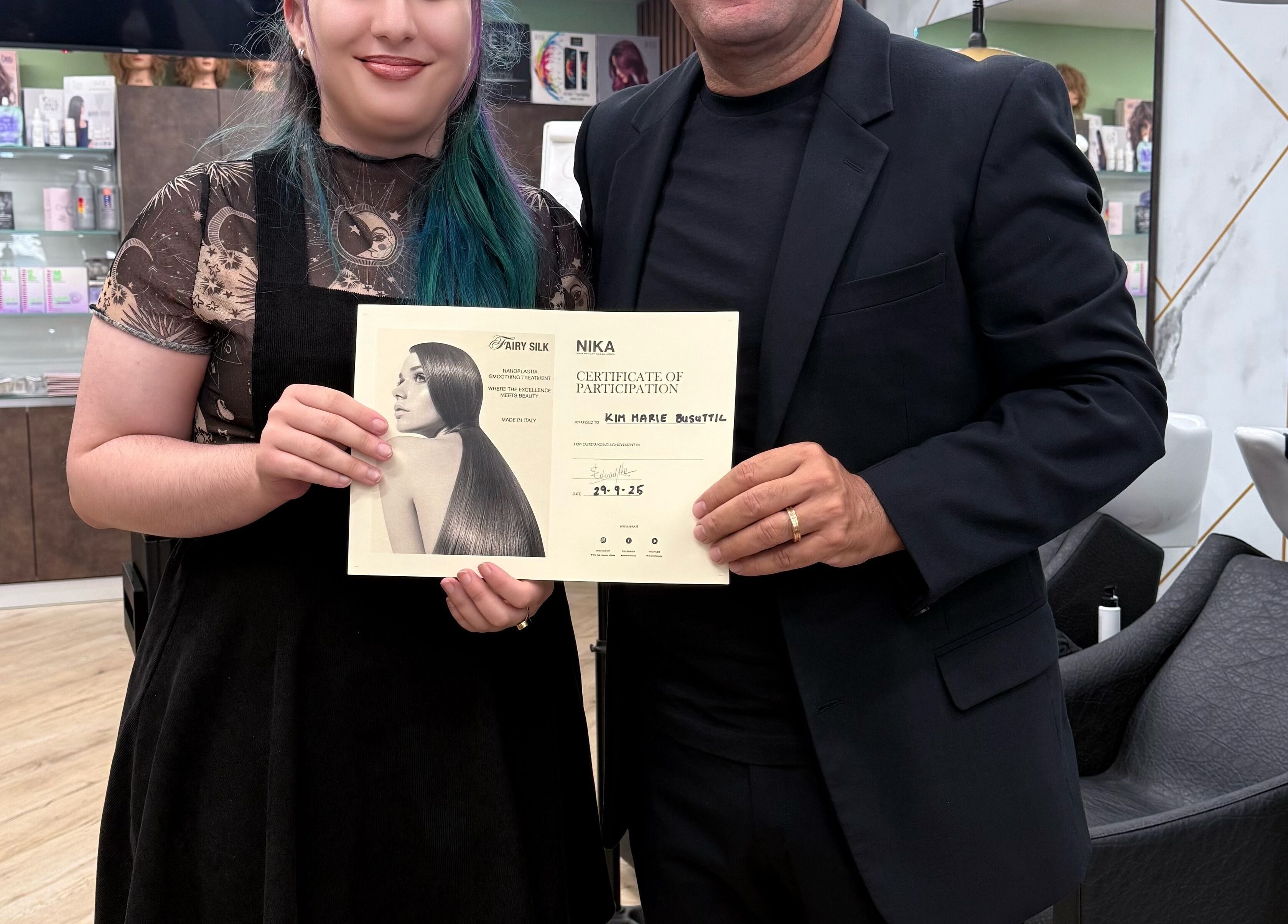 Enchante Hair Team in Il-mosta, MT celebrates with a certificate award ceremony.