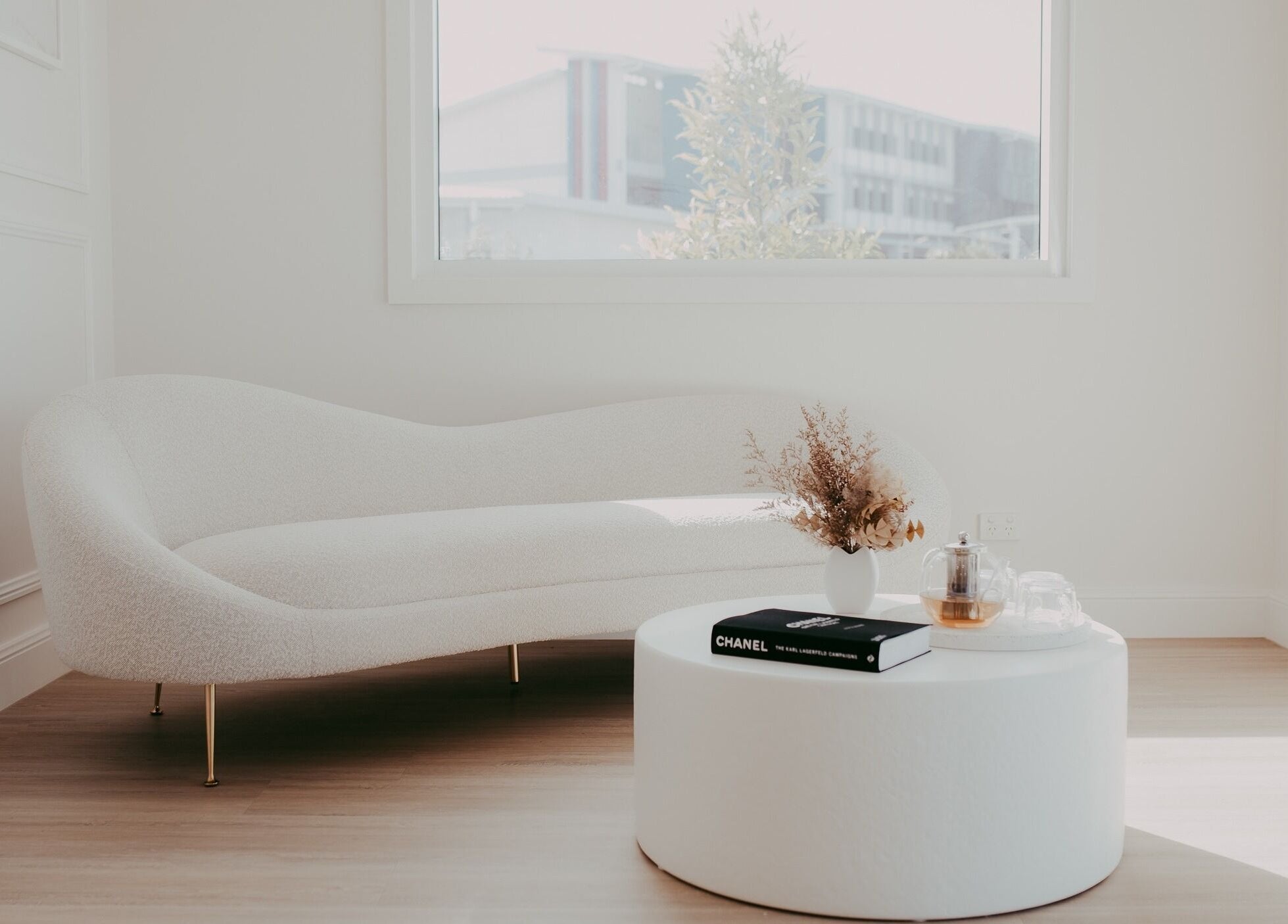 Serene interior of Meridian Aesthetics Yarrabilba, Yarrabilba, Queensland, AU featuring a chic white sofa.
