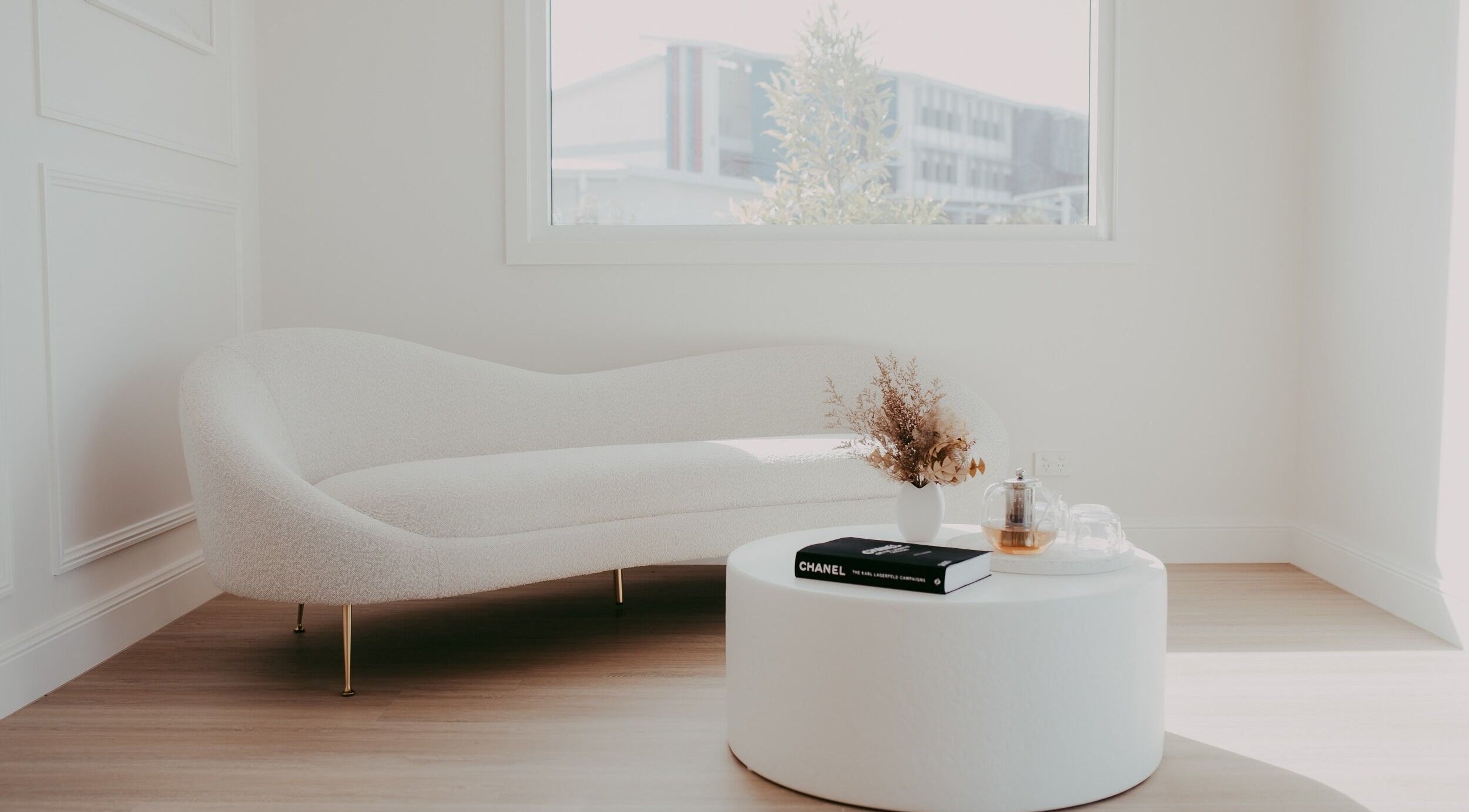 Serene interior of Meridian Aesthetics Yarrabilba, Yarrabilba, Queensland, AU featuring a chic white sofa.