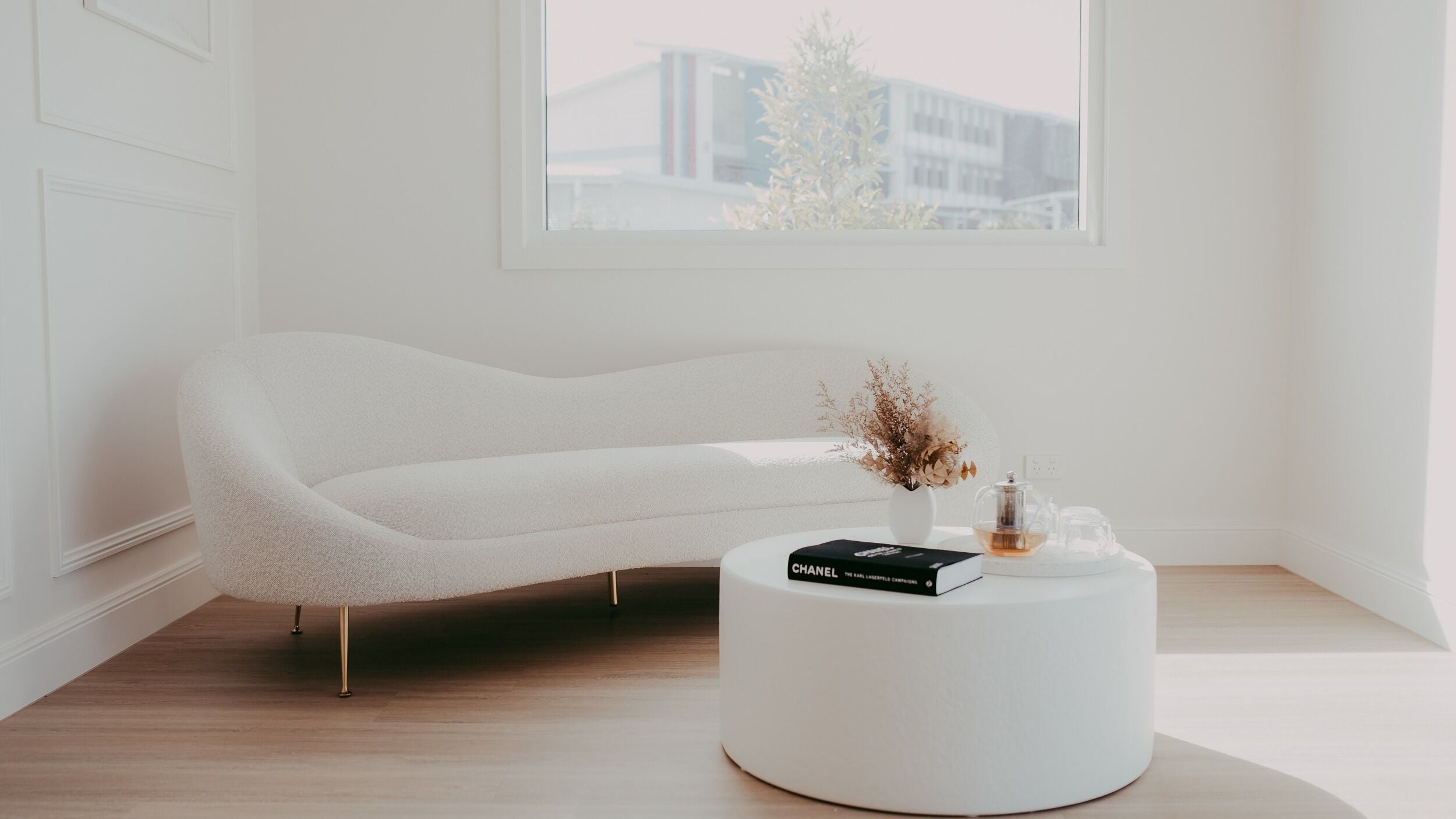 Serene interior of Meridian Aesthetics Yarrabilba, Yarrabilba, Queensland, AU featuring a chic white sofa.