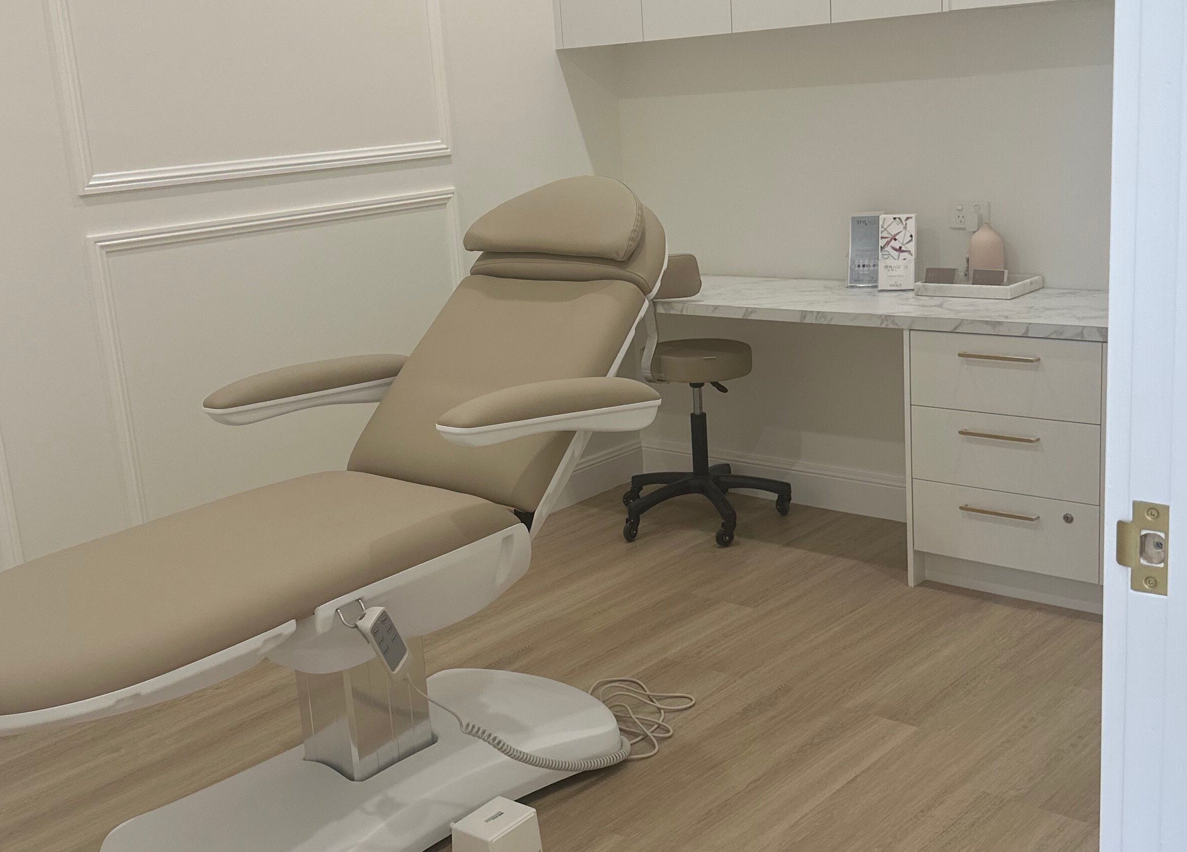 Elegant treatment room at Meridian Aesthetics Yarrabilba, Yarrabilba, Queensland, AU with a comfortable recliner.