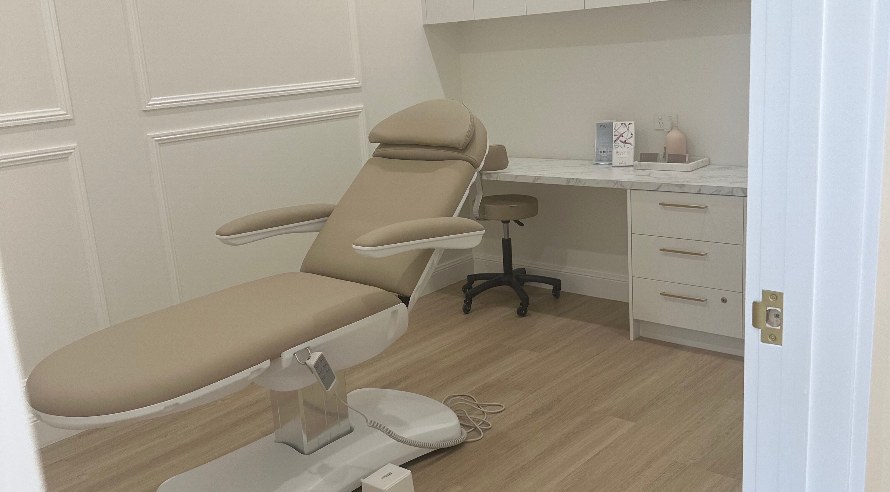 Elegant treatment room at Meridian Aesthetics Yarrabilba, Yarrabilba, Queensland, AU with a comfortable recliner.
