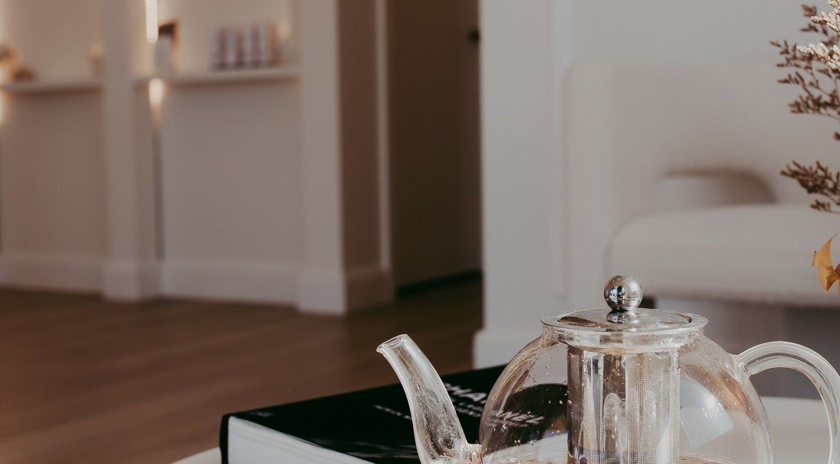 Glass teapot on a table at Meridian Aesthetics Yarrabilba, Yarrabilba, Queensland, AU, creating a relaxing atmosphere.