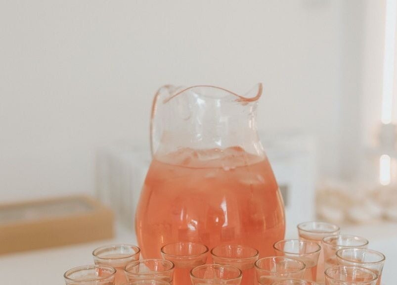 Pitcher of pink drink and glasses at Meridian Aesthetics Yarrabilba, Yarrabilba, Queensland, AU.