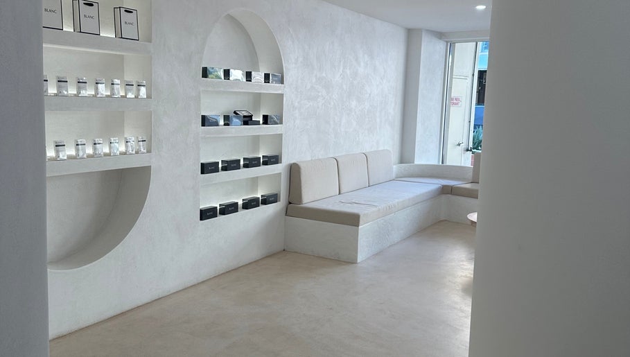 Elegant lounge with shelves at Meridian Aesthetics | Surfers Paradise, Queensland, AU.