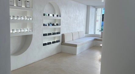 Elegant lounge with shelves at Meridian Aesthetics | Surfers Paradise, Queensland, AU.