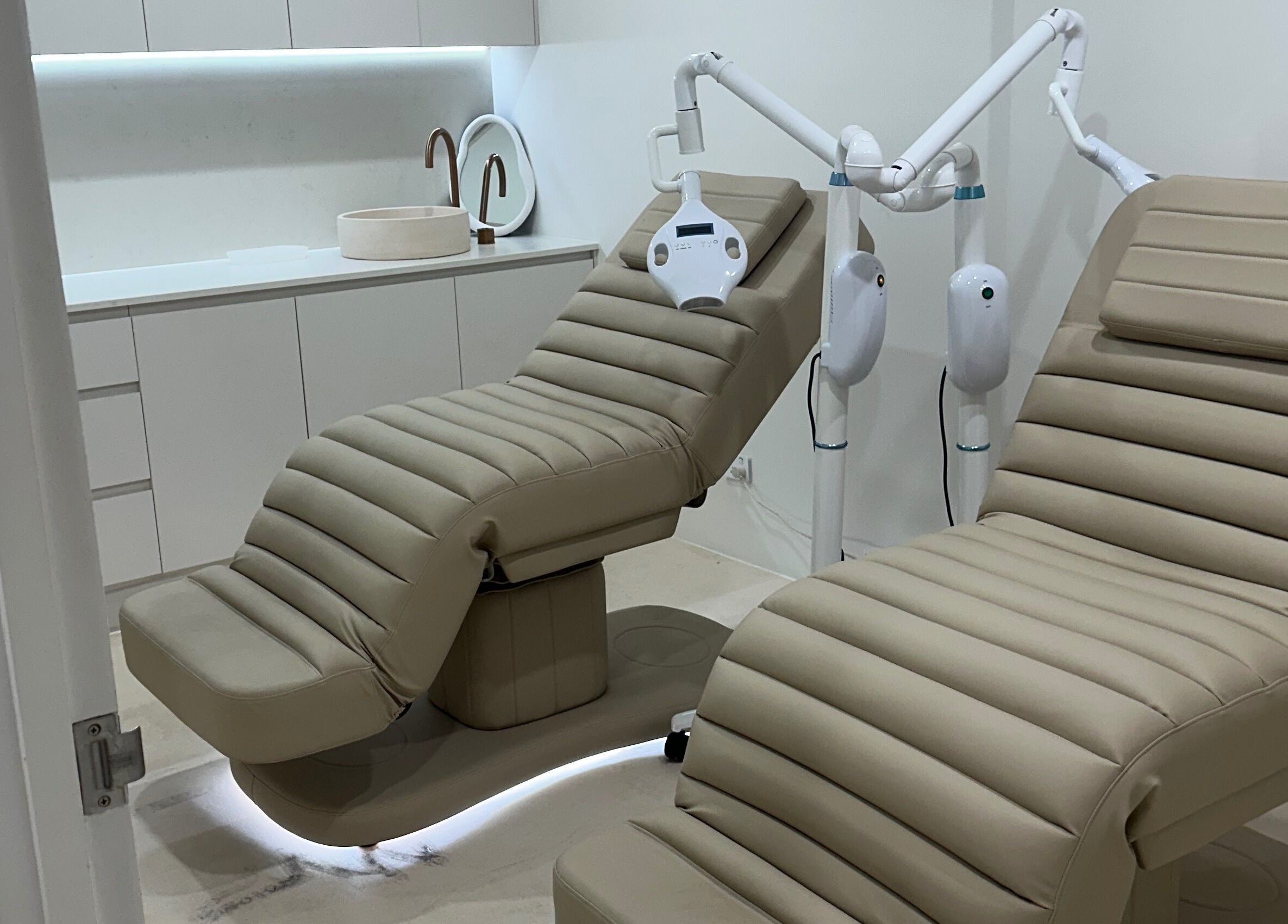 Elegant treatment chairs at Meridian Aesthetics | Surfers Paradise, Queensland, AU spa facility.