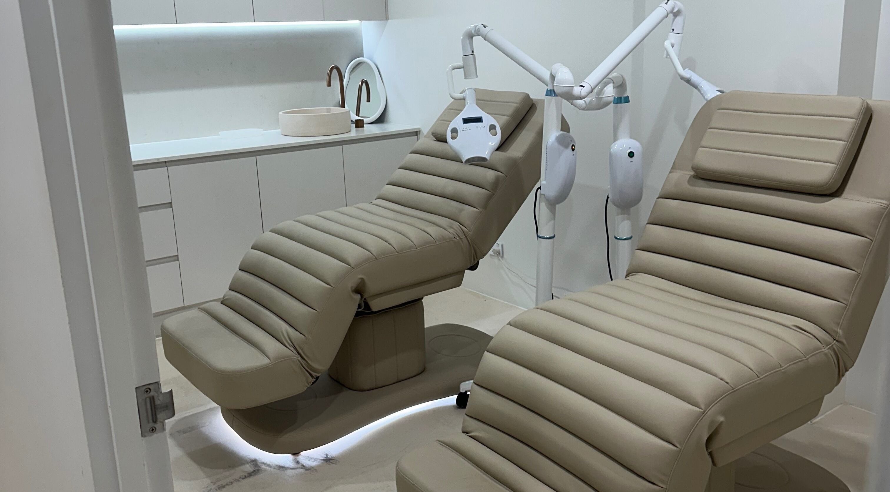 Elegant treatment chairs at Meridian Aesthetics | Surfers Paradise, Queensland, AU spa facility.