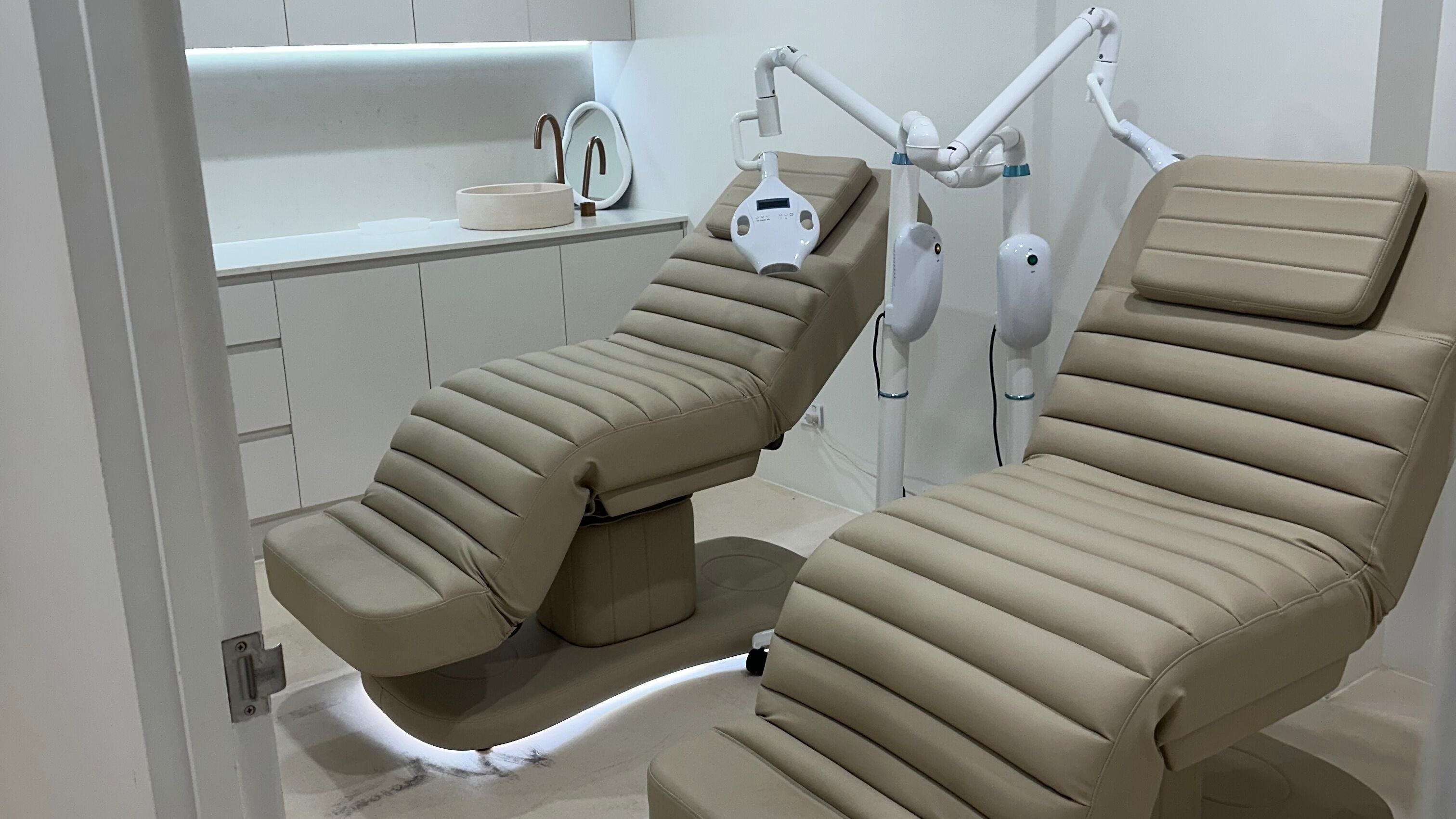 Elegant treatment chairs at Meridian Aesthetics | Surfers Paradise, Queensland, AU spa facility.