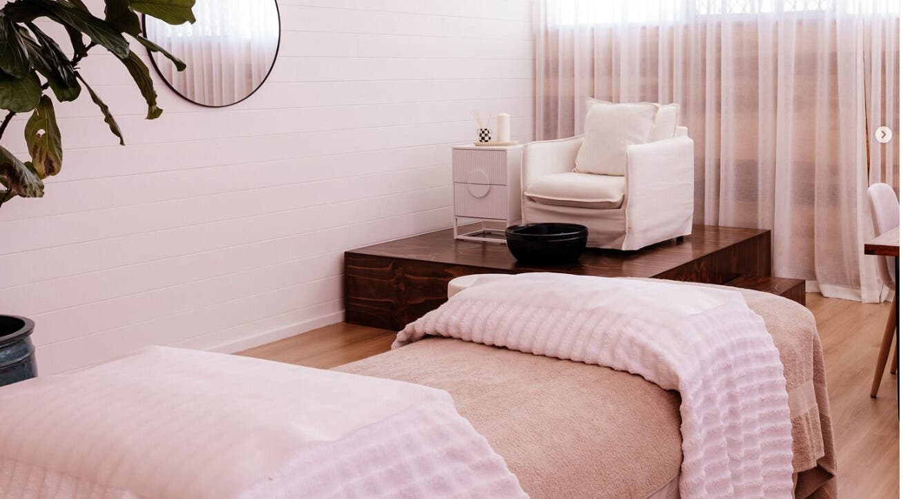 Relaxing treatment room at Studio Rebecca Greaves, Devonport, Tasmania, AU with cozy seating and soft lighting.