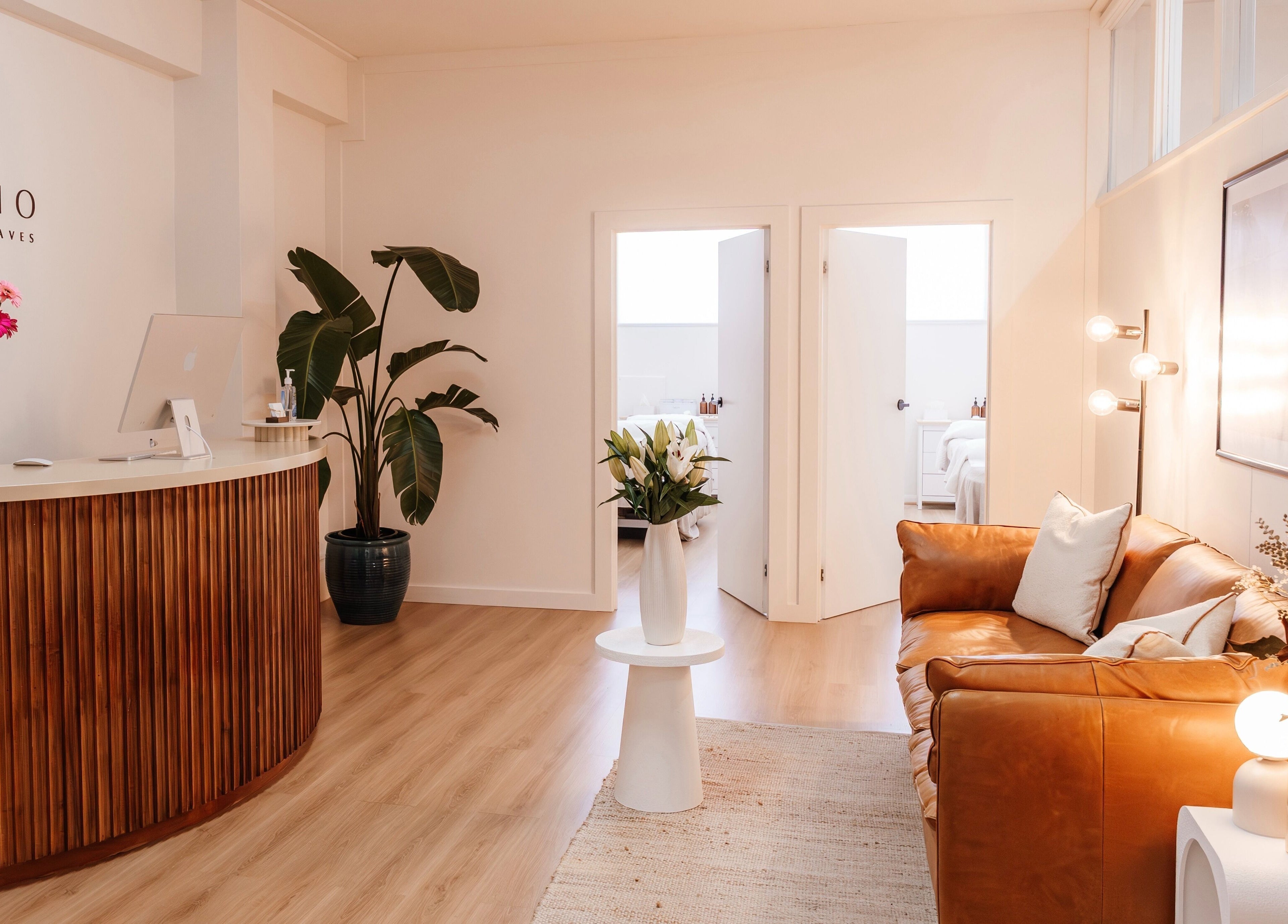 Welcoming interior at Studio Rebecca Greaves in Devonport, Tasmania, AU, featuring stylish decor and a cozy seating area.