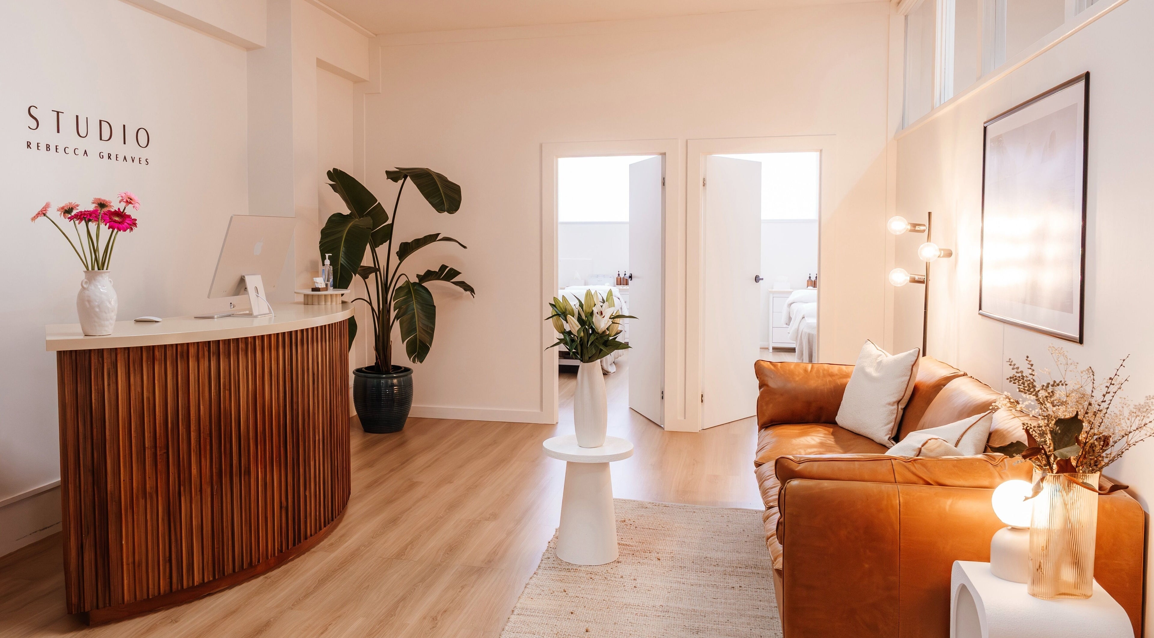 Welcoming interior at Studio Rebecca Greaves in Devonport, Tasmania, AU, featuring stylish decor and a cozy seating area.