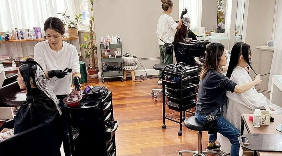 Stylists at Alpha Japanese Hair Salon in Haymarket, NSW, AU, providing exceptional hair care services.